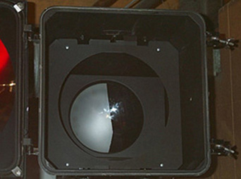 Black side of 'masking' tape seen from the front of the light